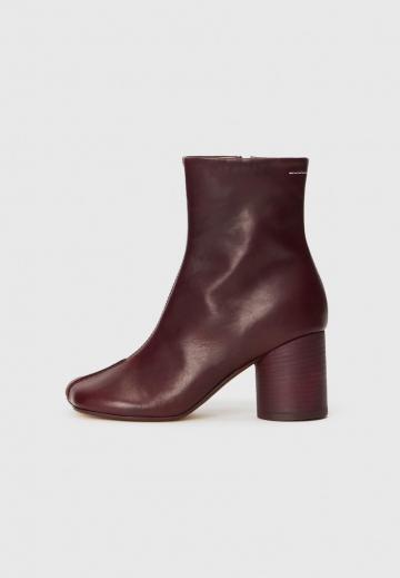 Высокие сапоги