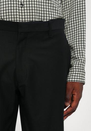 Клешеные джинсы