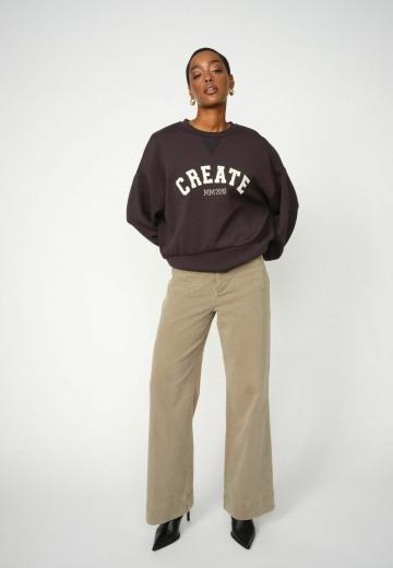 Клешеные джинсы