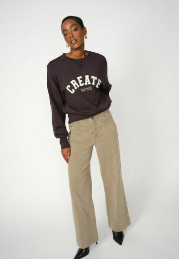 Клешеные джинсы