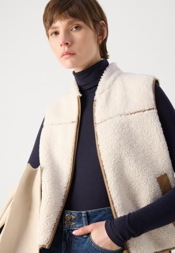 Пуховой жилет