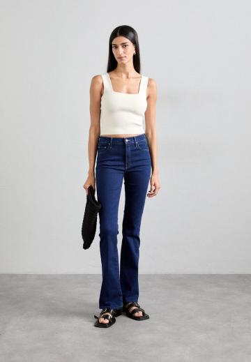 Клешеные джинсы