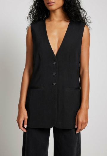 Длинный жилет