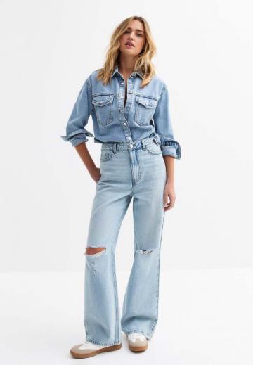 Клешеные джинсы