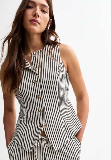 Джинсовая жилетка