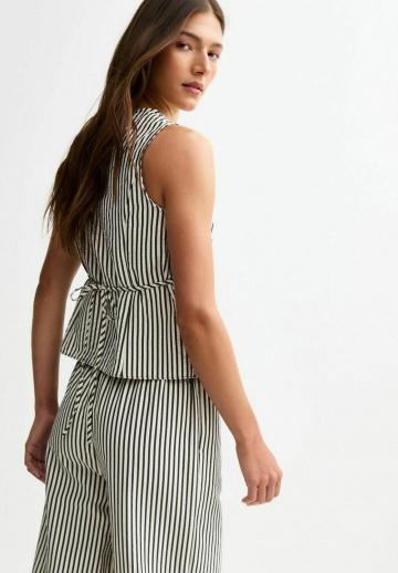 Джинсовая жилетка