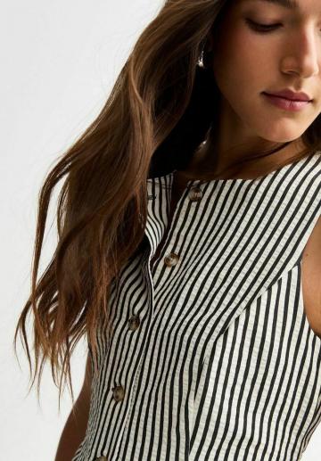 Джинсовая жилетка