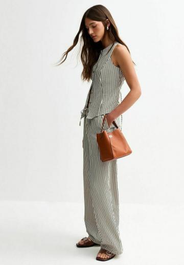 Джинсовая жилетка