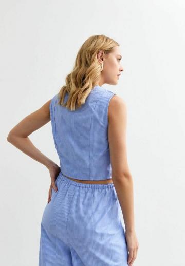 Джинсовая жилетка