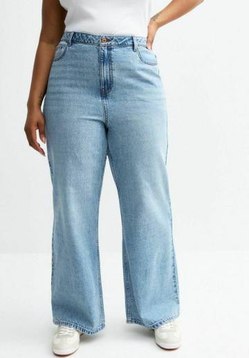 Клешеные джинсы