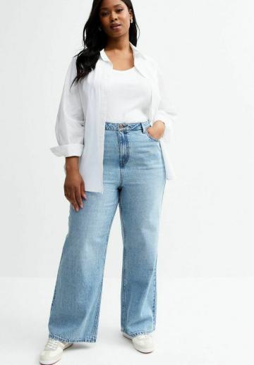 Клешеные джинсы