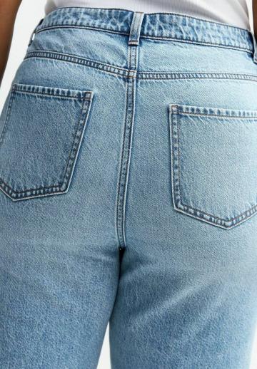 Клешеные джинсы