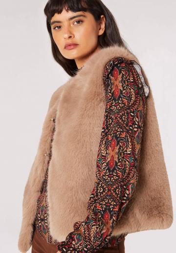 Пуховой жилет