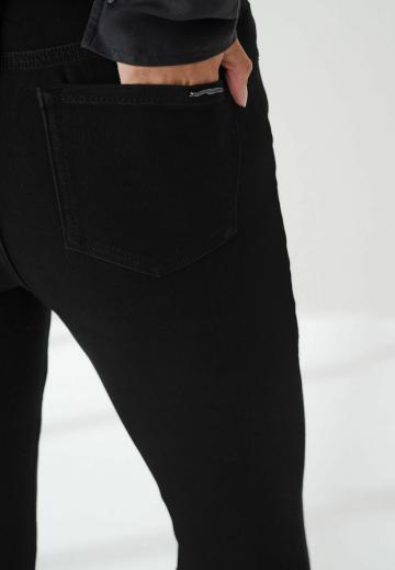 Клешеные джинсы