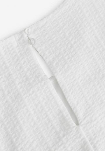 Блузка без рукавов