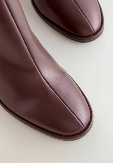 Полусапожки на высоком каблуке