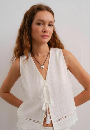 Джинсовая жилетка