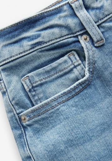 Клешеные джинсы