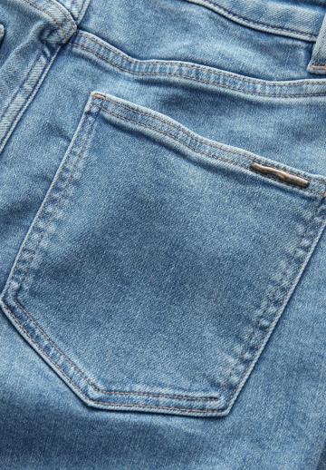 Клешеные джинсы