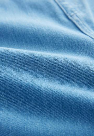 Клешеные джинсы