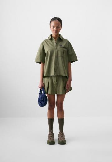 Юбка с накладными карманами