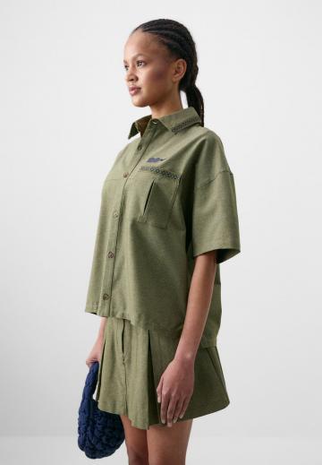 Юбка с накладными карманами