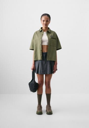 Юбка с накладными карманами