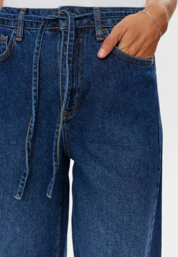 Клешеные джинсы