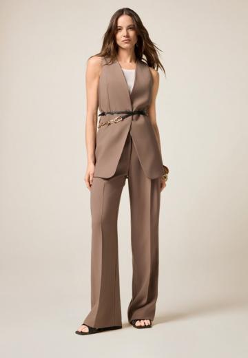 Длинный жилет