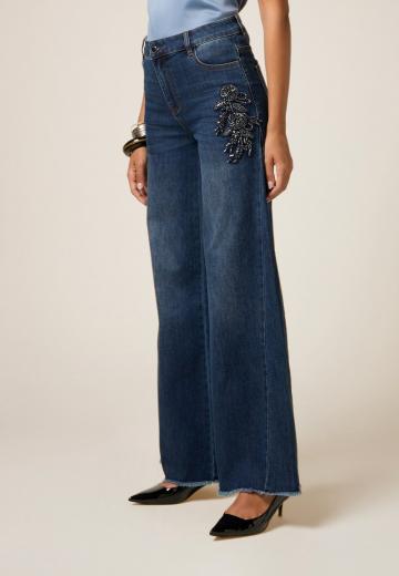 Клешеные джинсы