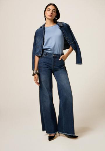 Клешеные джинсы