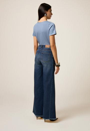 Клешеные джинсы