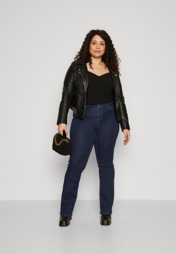 Клешеные джинсы