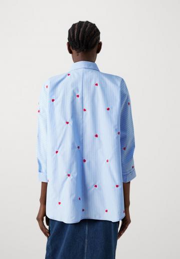 Длинная блузка