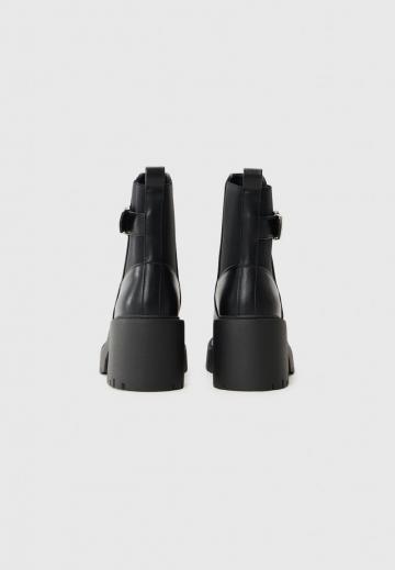 Высокие сапоги