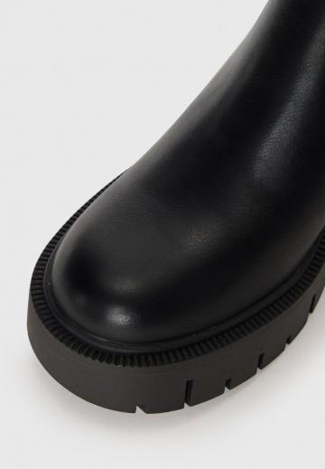 Высокие сапоги