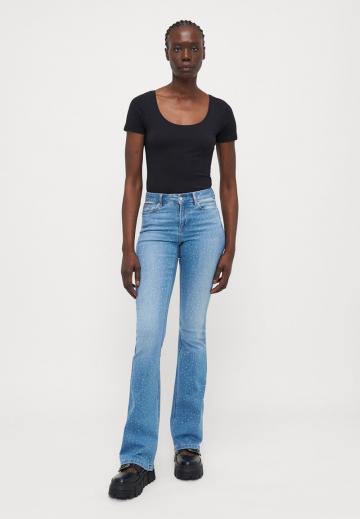 Клешеные джинсы