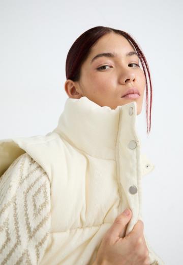 Стеганый жилет