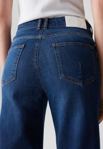 Клешеные джинсы