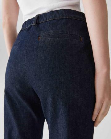 Клешеные джинсы