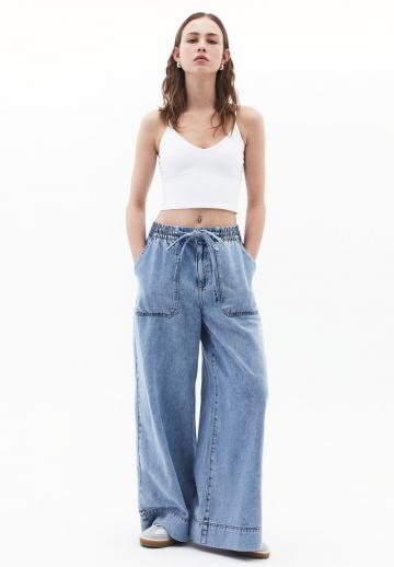 Клешеные джинсы