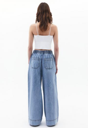 Клешеные джинсы