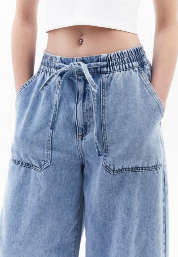 Клешеные джинсы