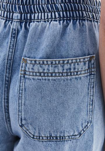 Клешеные джинсы