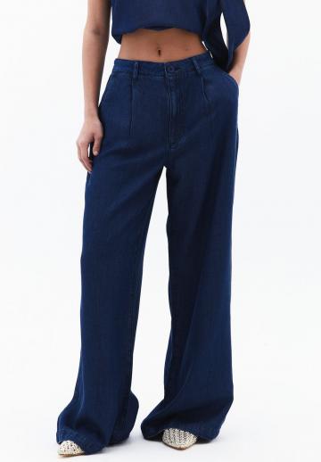 Клешеные джинсы