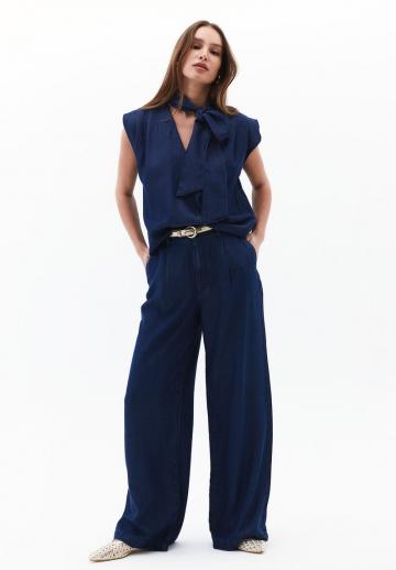 Клешеные джинсы