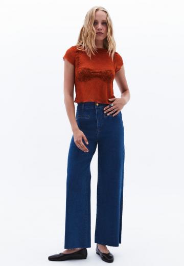 Клешеные джинсы