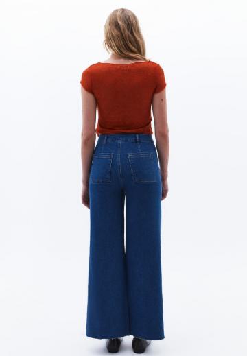 Клешеные джинсы