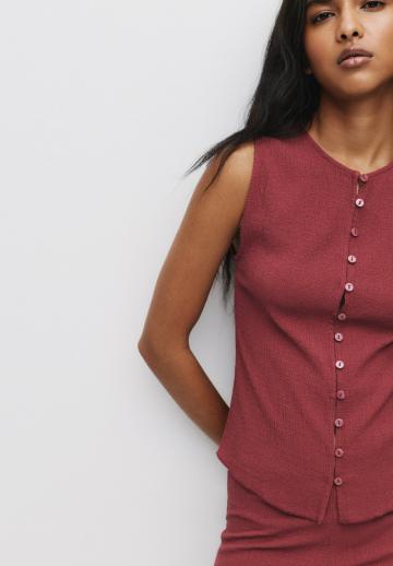 Блузка без рукавов