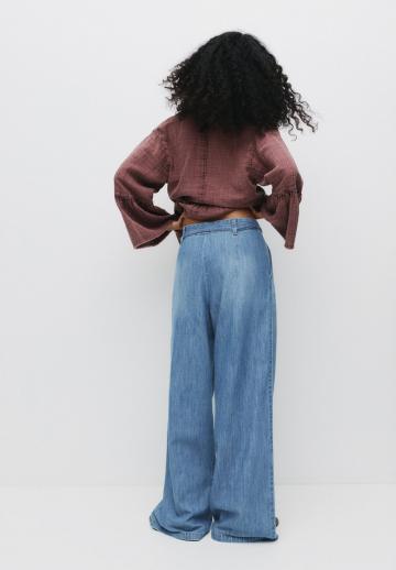 Клешеные джинсы